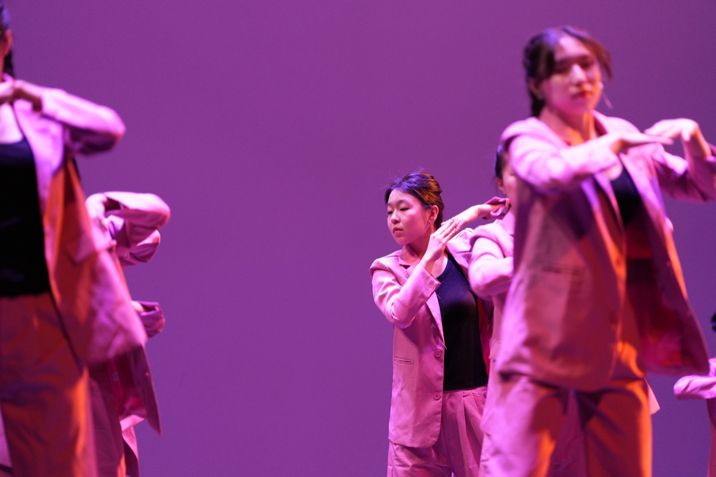 Dance performer purple stage