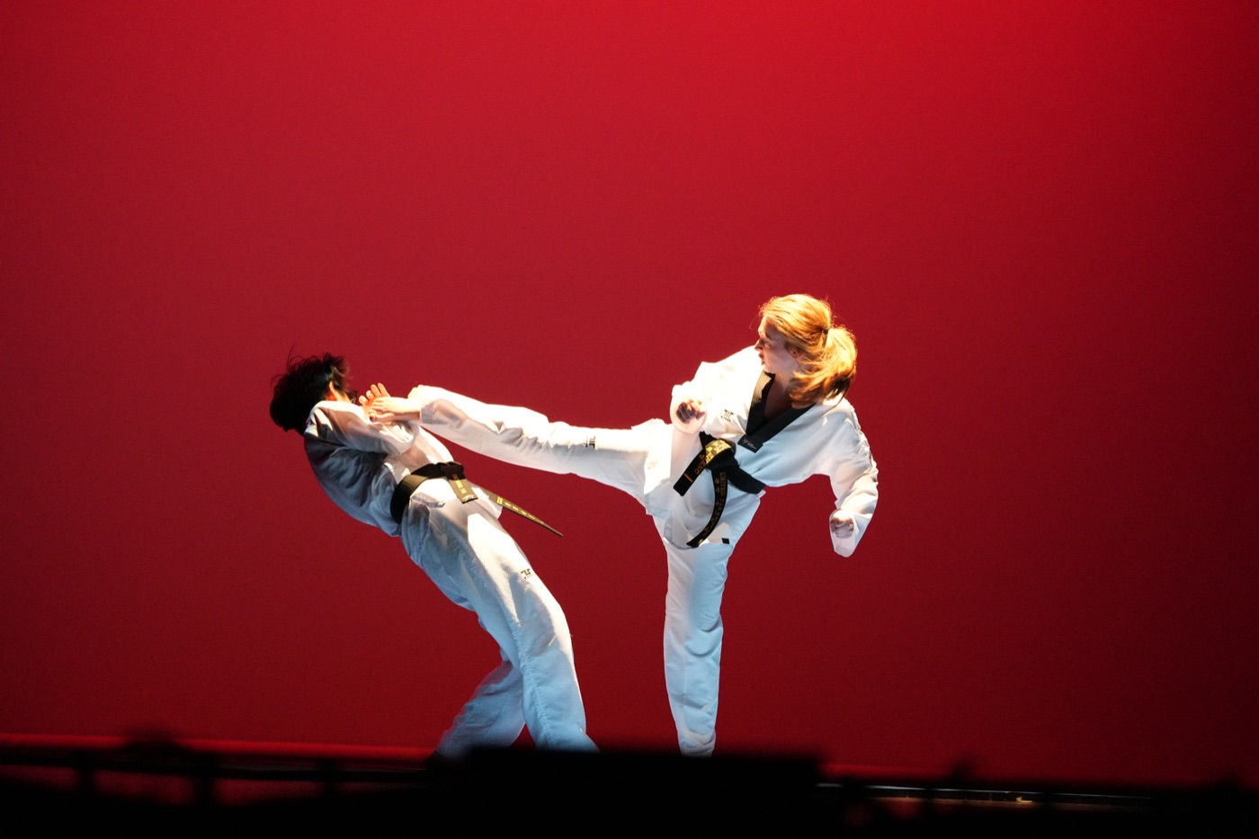 Taekwondo sparring red stage